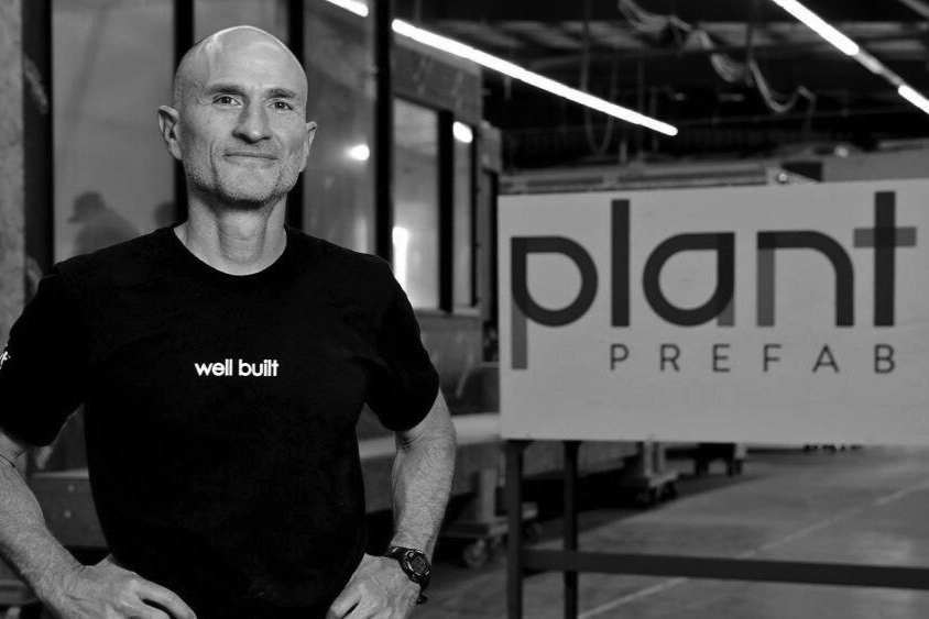 Steve Glenn standing in the Plant Prefab factory in Rialto, California